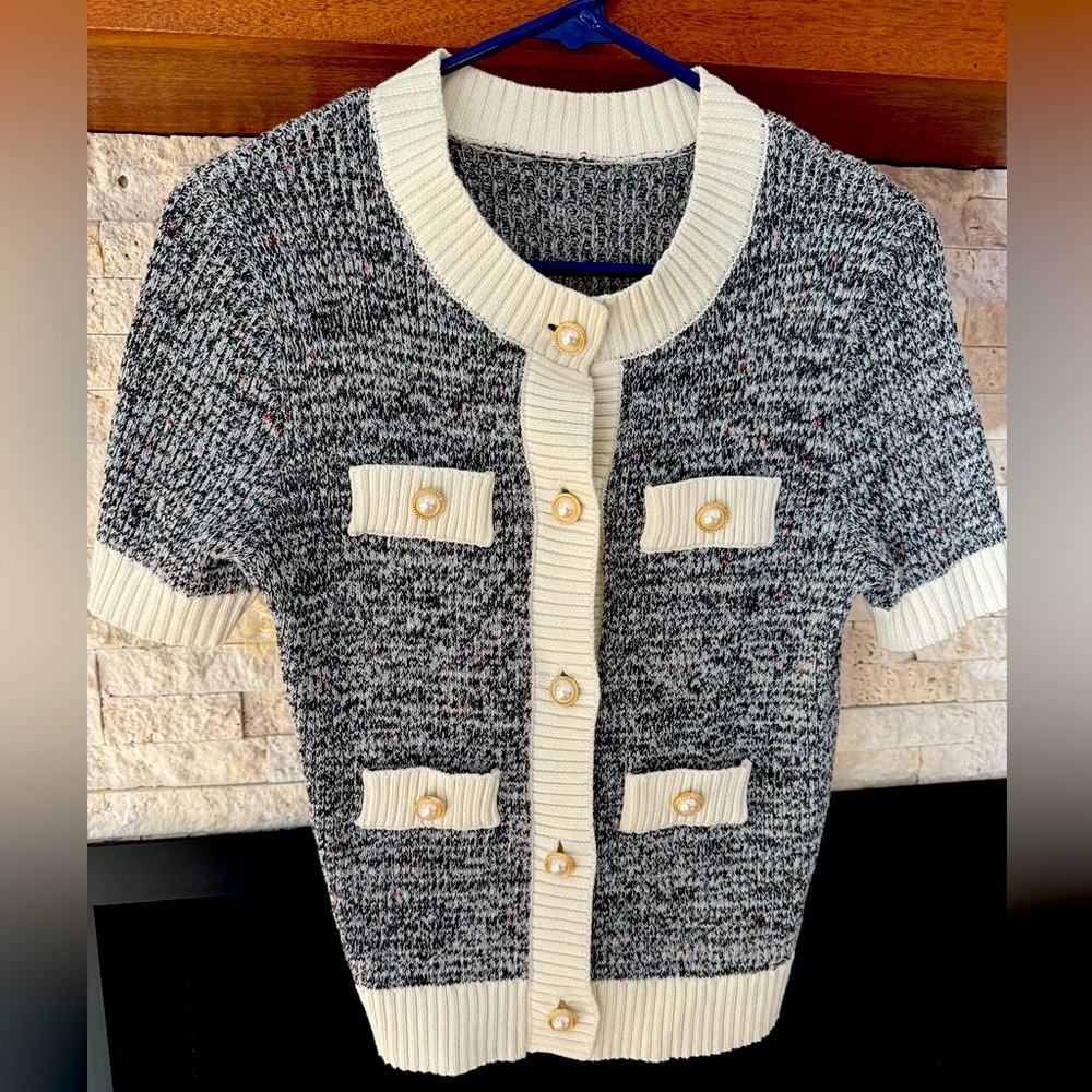 Adorable sweater with pearl buttons, never worn